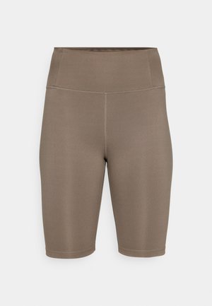 Braune Fahrradshorts aus dehnbarem Material mit hohem Bund. Verfügt über eine glatte Textur und flache Nähte für zusätzlichen Komfort. Keine sichtbaren Logos oder Muster.