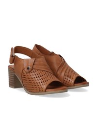 Braune Leder-Absatzsandalen mit perforiertem Design, offenen Zehen, einem Slingback-Riemen und einem stabilen Blockabsatz. Mit einem Seitenknopf akzentuiert.