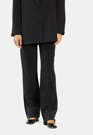 Pantalones - black