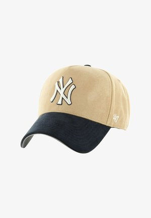 Beige and black baseball cap with white "NY" logo on front and "'47" stitched on side, displayed against white background.