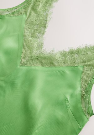 Zöld szatén ruhadarab, csipkével díszített nyakkivágással és karöltővel. Sima textúra, finom virágmintás csipkével.