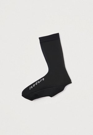 Ciorap impermeabil negru cu o potrivire strânsă, având o textură netedă și un design simplu. Logo-ul "Isadore" tipărit în alb pe lateral.
