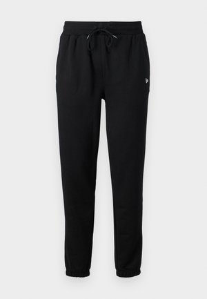 Pantalones de chándal negros con cintura elástica, cordón ajustable y puños elásticos. Hechos de una tela suave con un pequeño detalle de logo.