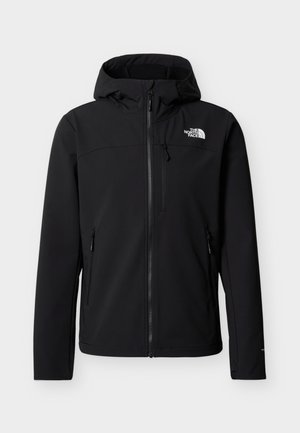 Mustas kapuutsiga välisjope esiklapi tõmblukuga, kahe külje tõmblukuga tasku, rinnatasku tõmblukuga ning valge "The North Face" logo rinnal.