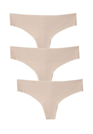 Tre paia di biancheria intima senza cuciture color beige sono impilati. Il tessuto è liscio con una texture opaca e presenta un design minimalista e senza cuciture visibili.