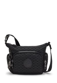 Black crossbody bag made of textured nylon, featuring a patterned surface, a front zip pocket, and a decorative charm on the zipper pull.