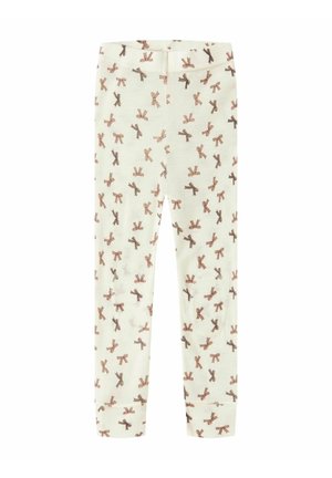 Leggings bianchi con un motivo ripetuto di cravatte a farfalla marroni. Tessuto morbido e elastico, con un design aderente e una vita elastica.