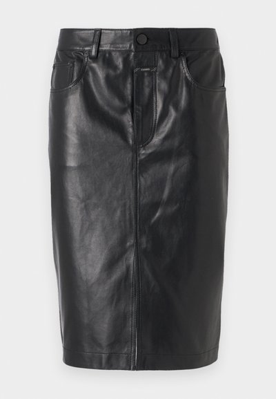 Black leather skirt with a fitted design, mid-length cut, front zipper, and two pockets. Smooth texture with visible stitching accents.