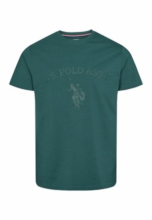 Tumši zila kokvilnas T-kreklu ar īsām piedurknēm, apaļu kakla izgriezumu un smalku U.S. Polo Assn. logo druku gaišākā toņā priekšpusē.