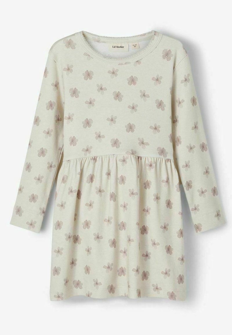 Robe à manches longues de couleur crème avec petit imprimé floral marron clair et taille froncée, conçue pour les tout-petits ou les jeunes enfants.