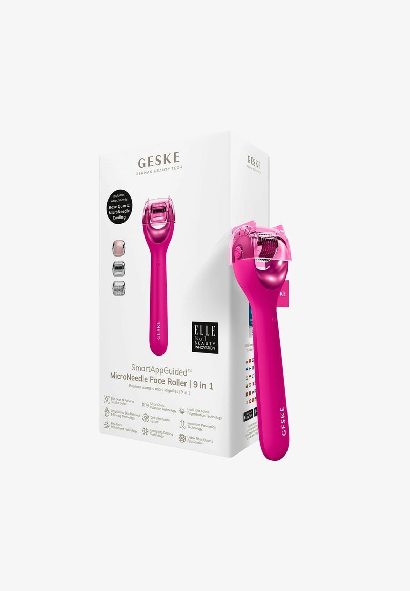 Rouleau facial en micro-aiguilles rose avec une tête texturée, un manche ergonomique, et une boîte blanche comportant des détails sur le produit et des étiquettes en plusieurs langues.