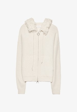 Krémová zipsová mikina s huňatým golierom, vybavená dvoma prednými vreckami, šnúrkou a rebrovanými manžetami a spodným lemom.