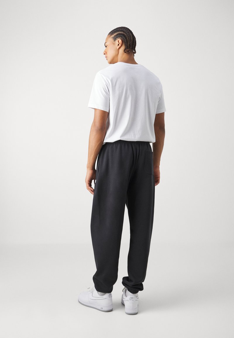 New Balance RELAXED FIT - Pantaloni sportivi - athletic grey ag/grigio