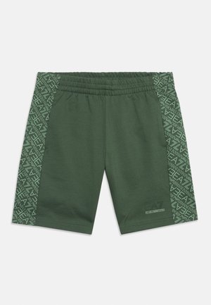 Green shorts with elastic waistband, patterned side panels featuring repeated "EA7 Emporio Armani" text, and small logo on the left leg.