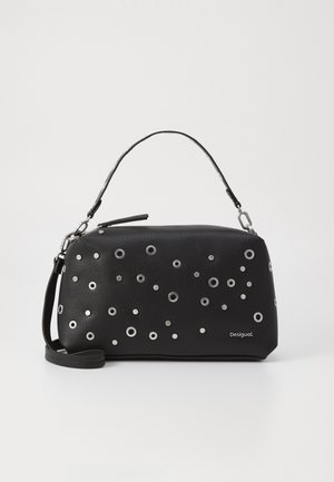 Black leather handbag with silver circular studs, rectangular shape, short handle, and adjustable strap. Brand logo displayed on the side.
