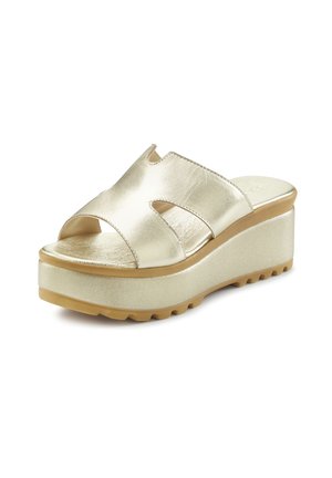 Gold metallic platform slide sandals with a smooth texture, cut-out design, and a thick rubber sole. Features a rounded toe and casual style.