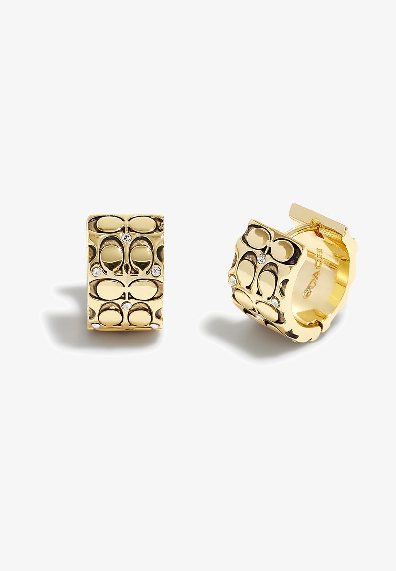 Gold-tone earrings with a rectangular shape, featuring a cut-out pattern and five small clear stones. Hinged closure on one side.