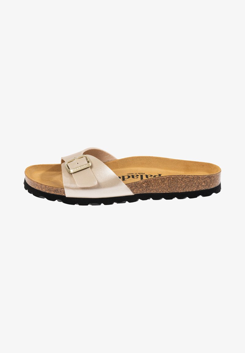 Beige slipper met een metalen gesp, kurken middenzool en zwarte rubberen outsole. Gladde bovenkant met een gestructureerde binnenzool voor comfort.