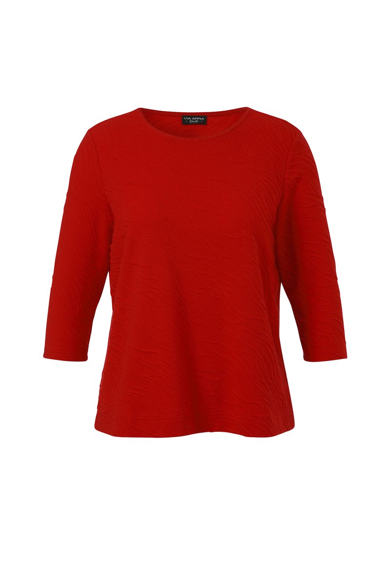 Red textured women's top with three-quarter sleeves and a round neckline, displayed against a white background.