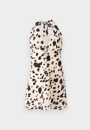 Φόρεμα με λαιμόκοψη halterneck σε ανοιχτό μπεζ χρώμα με μαύρο πουά σχέδιο; διαθέτει κορδόνι στη μέση για ρυθμιζόμενη εφαρμογή.