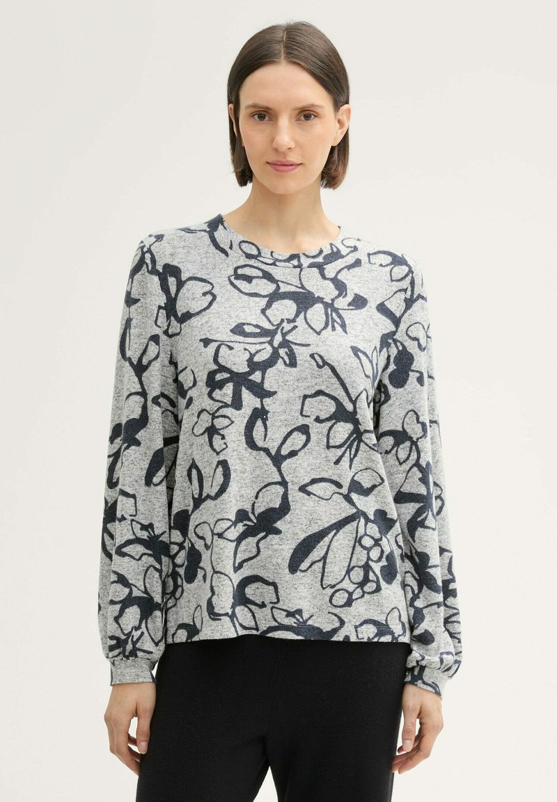 Grauer Pullover mit marineblumenmuster, runder Ausschnitt, langen Ärmeln und schmalen Bündchen. Weiche Textur und lockere Passform.