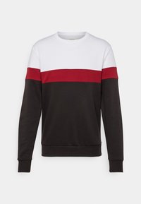 Color-blocket sweatshirt med en hvid øverste sektion, en rød midterstribe og en mørkebrun nederste sektion. Bomuldsmateriale med lange ærmer.