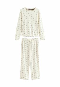 Long-sleeve, light cream pajama set with all-over small bow print; ribbed texture; elastic waistband with drawstring; scalloped edges.
