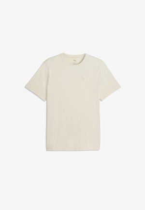 T-shirt beige à manches courtes col rond avec un petit logo brodé sur le côté gauche de la poitrine.