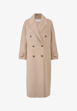 Beige dobbeltbrystet frakke lavet af uld, med en spids krave, store knapper og opbrugte ærmer. Lige silhuet og knælangt design.