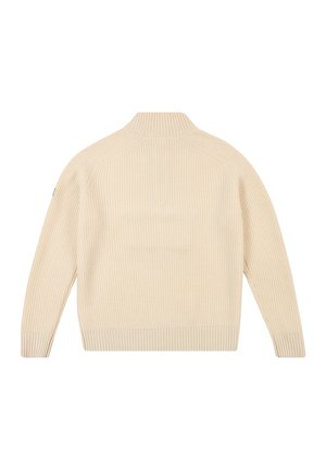 Suéter de punto acanalado en color beige con cuello alto, mangas largas y puños elásticos. La parte trasera presenta un diseño sin costuras.
