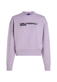 Lilac sweatshirt featuring a crew neckline and cropped design. "KARL LAGERFELD JEANS" printed in bold black text across the front.