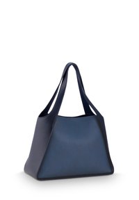 Navy leather tote bag with textured body and smooth accents, featuring elongated straps and a triangular shape.
