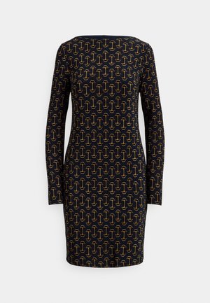 Black long-sleeve dress featuring a repeating yellow chain link pattern. Fitted design, rounded neckline, and smooth fabric texture.