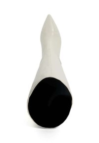 Pointed-toe high-heel boot in smooth off-white leather, featuring a sleek silhouette and black interior, with no visible hardware or patterns.