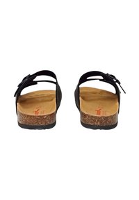 Sandali neri con suola in sughero, apertura sul retro e design a strappo con ritagli. Il plantare è color beige con un marchio discreto.