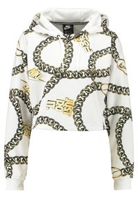 Bílá zkrácená mikina s kapucí s potiskem černého a zlatého řetězu, nápisem "Just Do It" a logy Nike, stahovací kapuce a žebrovanými manžetami.