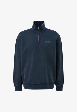 Marineblauwe fluwelen sweatshirt met hoge kraag, halve rits aan de voorkant, geribde manchetten en een kleine tekstafdruk op de bovenste linkerborst.