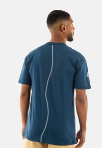 le coq sportif Camiseta estampada - bleu