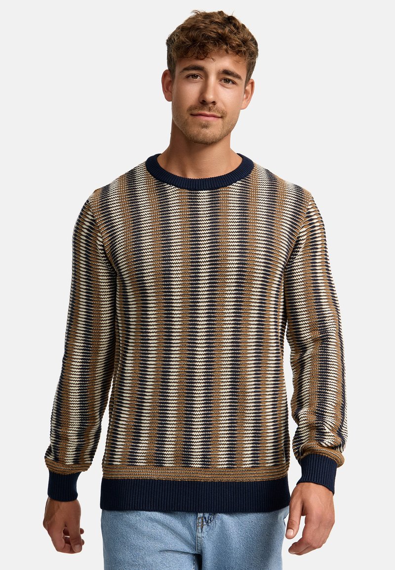Pull en tricot avec un motif rayé dans des tons de marron, crème et bleu marine. Col et poignets côtelés. Coupe décontractée.