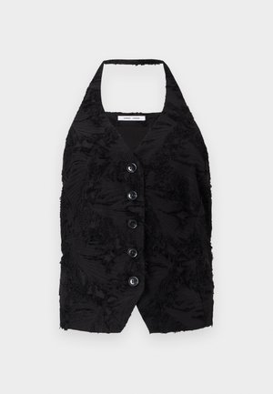 Must vest, mille tekstuuriga kangast, kõrgendatud mustritega, V-kaelusega ja kuue esimise nupuga. Ühe õlaga kaelus, ilma varrukateta, lühikese disainiga.