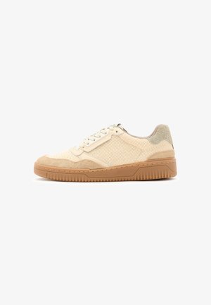 Sneakers with a beige mesh upper, suede accents, and a textured gum rubber sole. Features rounded toe and lace-up design.