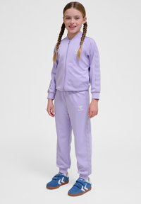 Hummel JOGGERS - Träningsbyxor - lavender