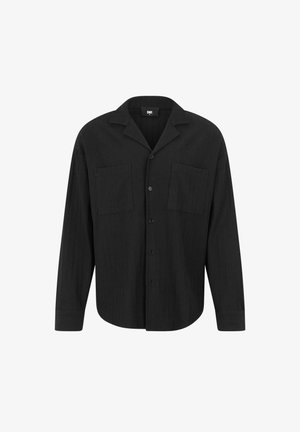 Black long-sleeve shirt with a notched collar, front button closure, two chest pockets, and vertical ribbed texture.