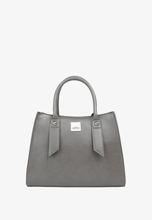 Sac à main en cuir gris avec deux anses et une étiquette rectangulaire argentée portant la mention « usha » au centre devant.