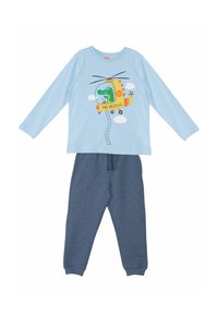 Camicia a maniche lunghe blu con grafica di un elicottero e un coccodrillo; pantaloni della tuta blu scuro con vita elastica e polsini.