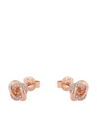 Pendientes de botón en oro rosa con un diseño de nudo y una piedra central naranja rodeada de pequeños cristales transparentes. Acabado suave y pulido.