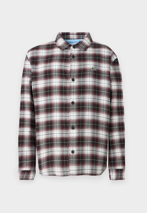 Plaid button-up shirt in dark red, black, and white; cotton blend fabric; features a fold-down collar and black buttons; logo on chest.