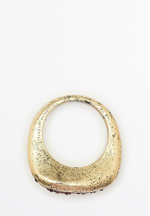 Gouden metalen armband met een glad, rond ontwerp en een gestructureerd oppervlak. Beschikt over een ronde opening en een gepolijste afwerking.