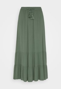 Jupe longue à plusieurs niveaux en tissu vert olive, dotée d'une taille à cordon de serrage avec des tassels et d'une texture douce et légère.