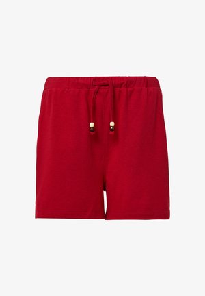 Shorts en coton rouges avec une taille élastique et un cordon de serrage, ornés de perles en bois. Coupe simple et droite sans poches.